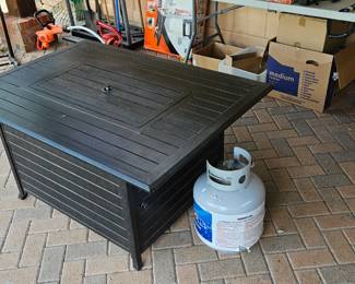 Fire Sense fire pit. Propane tank is full