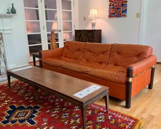 Mid-Century Modern Cocktail Table (18"D x 72"W x 14"H) & Orange Leather Sofa (34"D x 85"W x 27" Back Height)