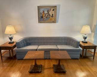 Tufted Blue Upholstered Low Profile 3 Seat Sofa (34"D x 27" Back Height x 92"W) Drexel Esperanto Mid-Century Modern Cocktail Tables (20"W x 20"D x 19"H each) & Drexel Esperanto 1 Drawer End Table (20"W x 26"D x 21"H / 2 Total) & Framed Original Oil on Canvas Harbor Scene signed V. Lund