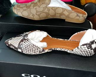 Three more pairs of new with the box Coach shoes. I am in love with the pink slides!