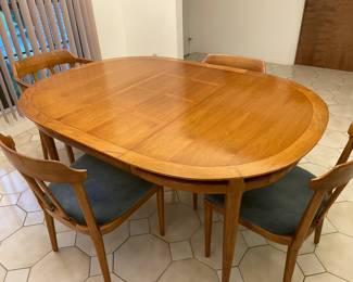 Dining Table 1955 era 2 more leaves & Table pads Excellent condition & Matching china cabinet