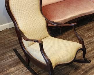 Upholstered wooden rocker