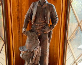 Large cowboy statue in plaster