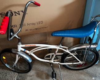 Another SCHWINN stingray original red, white and blue banana seat bicycle