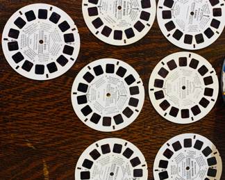 Close up of Disney Reels including Mickey Mouse, Bambi, Snow White, Lovebug, Disneyland, Mary, Poppins, and Donald Duck.