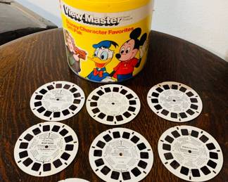 View master Set with Disney Reels including Mickey Mouse, Bambi, Snow White, Lovebug, Disneyland, Mary, Poppins, and Donald Duck.