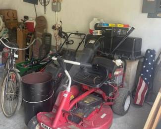 Vintage Snapper mower, bicycles and more.  Garage is full!