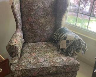 One of two upholstered chairs