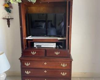 Entertainment center, one of several TVs