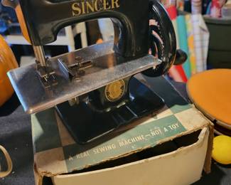 Antique mini Singer sewing machine