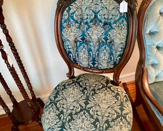 beautifully upholstered silk on carved wood frame