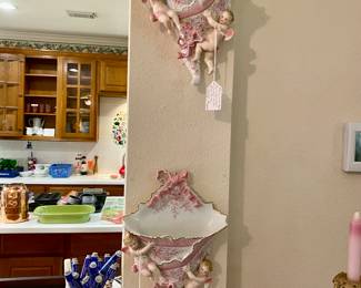 pair of wall vases porcelain with pink bows and cherubs , in perfect condition, so rare