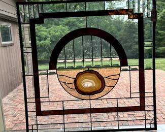 This stained glass piece is absolutely a show stopper!  Hang it anywhere in your home as a conversation piece.  Beautiful!