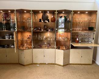 Mid Century Perfection!  This fabulous showcase with a built in bar is just what you need to display all of your treasures.  Such a rare find...you must come see this!