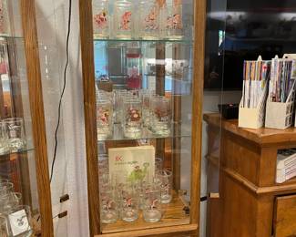 A second display of collector series glasses in lighted show case. (Show case is not for sale)