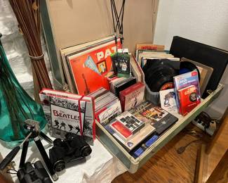 Vintage 45's, books on tape, CD's, binoculars, tripod 
