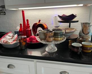Lot of great color glass, handmade mugs and pottery