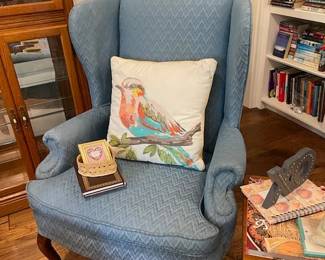 Upholstered wing back arm chair, bird cushion