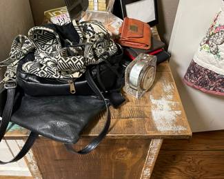 Leather purses, bags, wallets, clock and photo display pieces