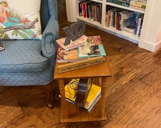 Accent table with vintage clock, books and magazines