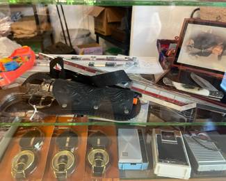 Cap gun, compasses, vintage pocket radios