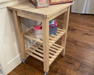 Pine butcher block on wheels with storage