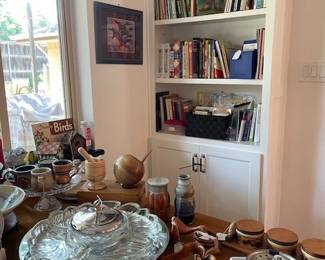 In the kitchen area, you will find cooking, gardening, bird books, vintage lazy Susan with original glass bowls, wood bowls, handmade ceramics