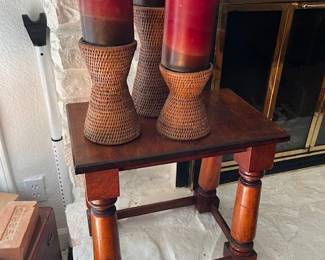 Wood accent table, three wicker candle holders