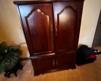 Mahogany tv armoire with tv