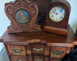 Antique clocks and handmade folk art frame