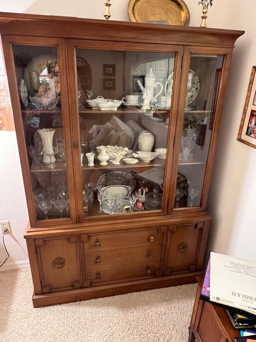 Cabinet has sold, along with some items inside. 