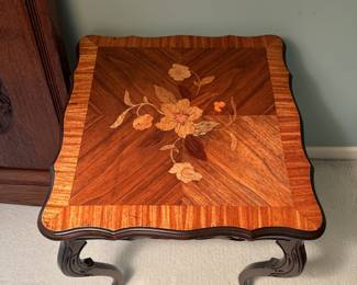 Square carved wood accent table with hand-painted floral motif 