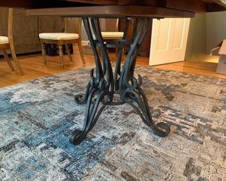 Nichols & Stone oak with iron pedestal dining table, and 4 armless chairs with cane backing