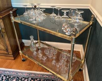 Mid century brass and glass bar cart on wheels