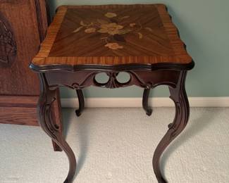 Square carved wood accent table with hand-painted floral motif 