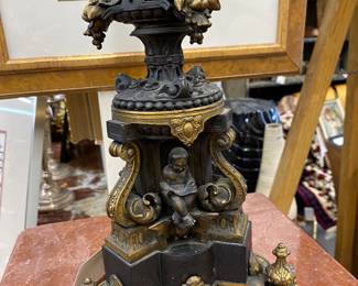 A pair of bronze and marble candle labras 19th century