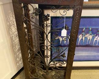 A pair of wrought iron and carved wood 19th century side pedestals With slate tops