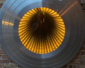 
1980s disco Infiniti mirror 46 inches across