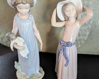 Lladro on left has sold / #5011 "Coy" $130 (right)