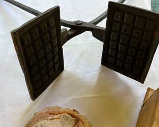 Antique cast iron waffle maker