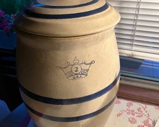 Lidded stoneware crock with spout