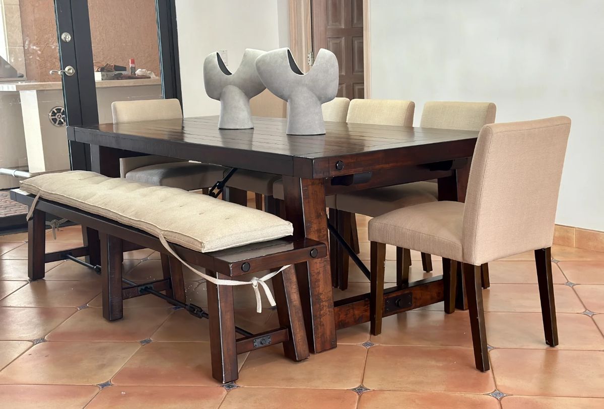 The table is from POTTERY BARN and the chairs from WEST ELM