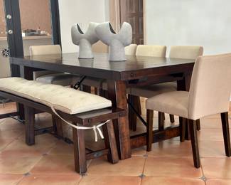 The table is from POTTERY BARN and the chairs from WEST ELM