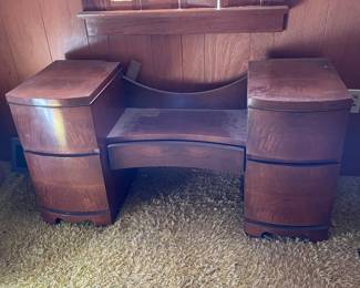 Has large round mirror that attaches to dresser