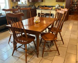 Set of 6 Farmhouse Windsor chairs by Logatec-$900.         Hand made Farm Table-$300