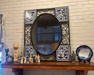 Wrought iron mirror with blue and white porcelin accents