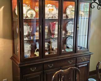 Lighted cherry traditional buffet and china cabinet. 