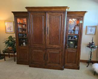 Lighted Sligh 3 piece distressed cherry entertainment cabinet.