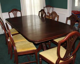 Drexel 8' mahogany dining table and 10 chairs, three leaves
