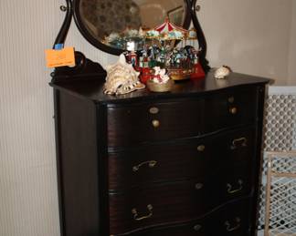serpentine-front chest of drawers, with mirror